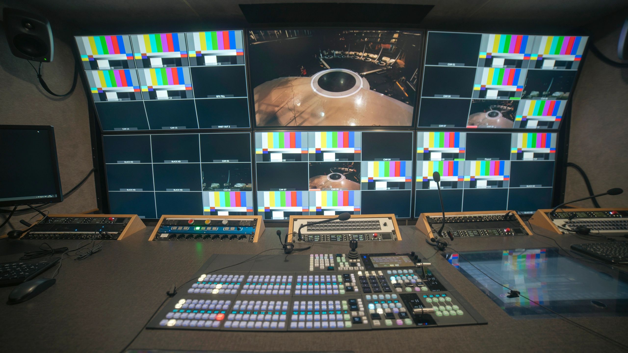 Professional control room with multiple displays representing advanced computing and display solutions